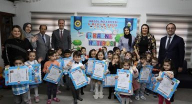 İnegöl'de 'Beşinci Mevsim'in minikleri ilk karnelerini aldı